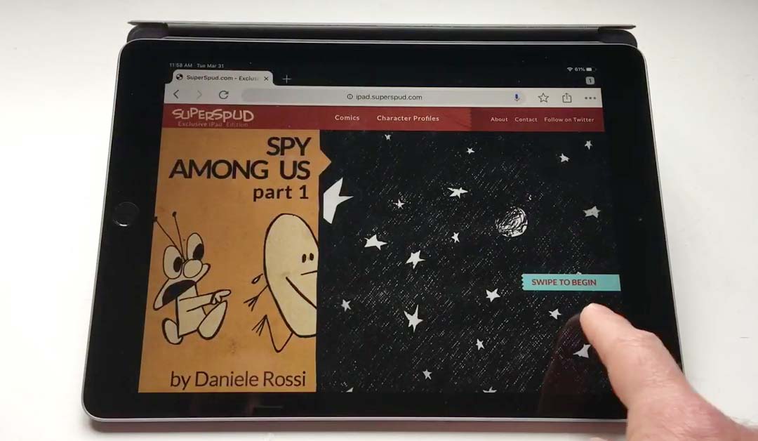 A finger swiping on an iPad to read comics